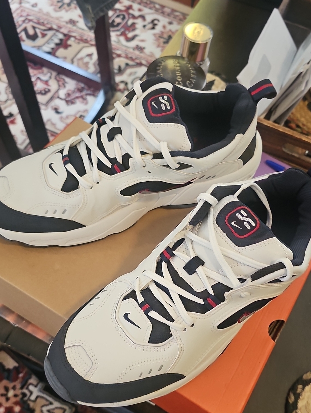 Men's White and Black Athletic Sneakers with Red Accents